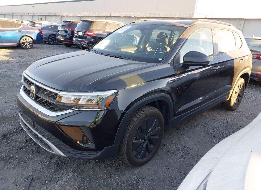 Photo 2 of 2022 Volkswagen Taos 1.5T S (VIN 3VVDX7B28NM022578)