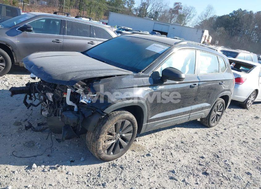 Photo 2 of 2022 Volkswagen Taos 1.5T S (VIN 3VVDX7B29NM025795)