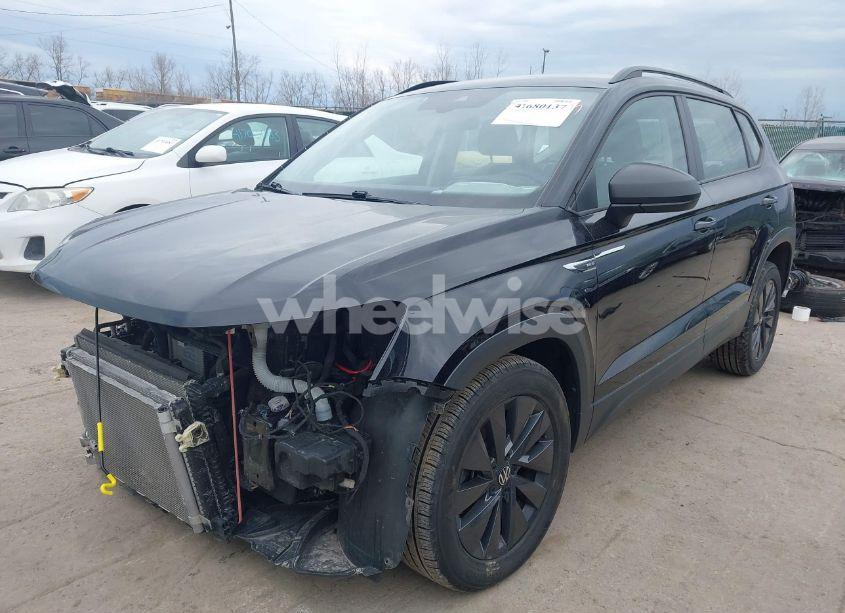 Photo 2 of 2022 Volkswagen Taos 1.5T S (VIN 3VVMX7B2XNM038376)