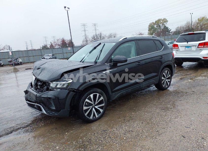 Photo 2 of 2023 Volkswagen Taos 1.5T SE (VIN 3VVNX7B22PM336007)
