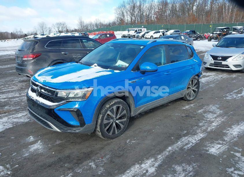 Photo 2 of 2023 Volkswagen Taos 1.5T SE (VIN 3VVNX7B22PM342731)