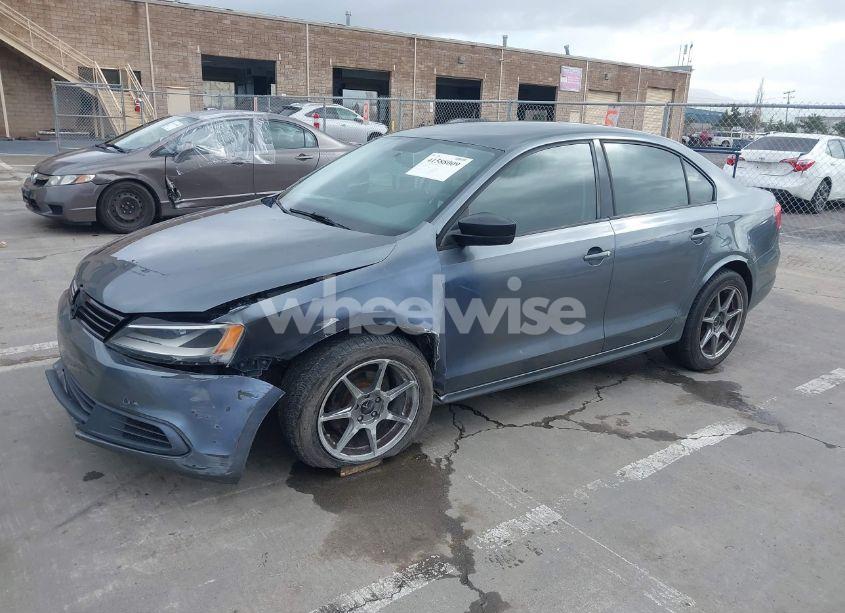 Photo 2 of 2014 Volkswagen Jetta 2.0L S (VIN 3VW2K7AJ8EM230714)