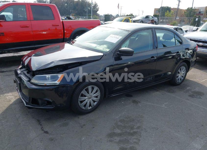 Photo 2 of 2013 Volkswagen Jetta 2.0L S (VIN 3VW2K7AJXDM301247)