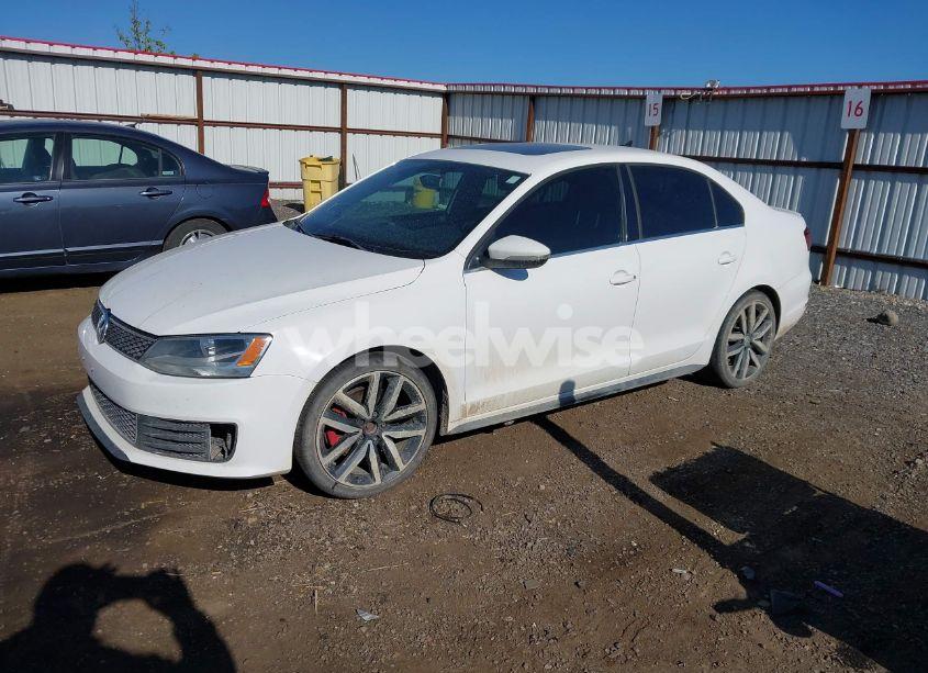 Photo 2 of 2013 Volkswagen Jetta (VIN 3VW5T7AJ9DM434883)