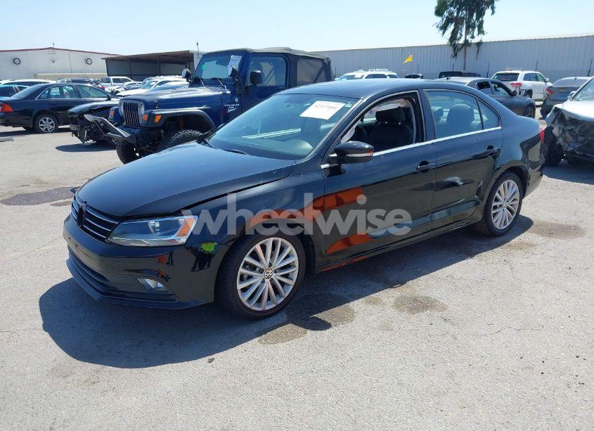 Photo 2 of 2015 Volkswagen Jetta 1.8T SE (VIN 3VWD17AJ5FM214385)