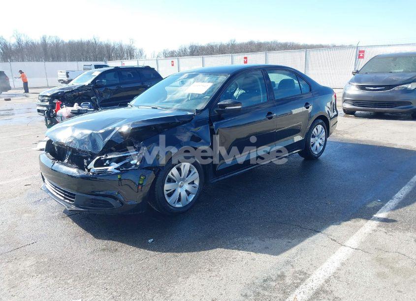 Photo 2 of 2011 Volkswagen Jetta 2.5L SE (VIN 3VWDX7AJXBM348124)