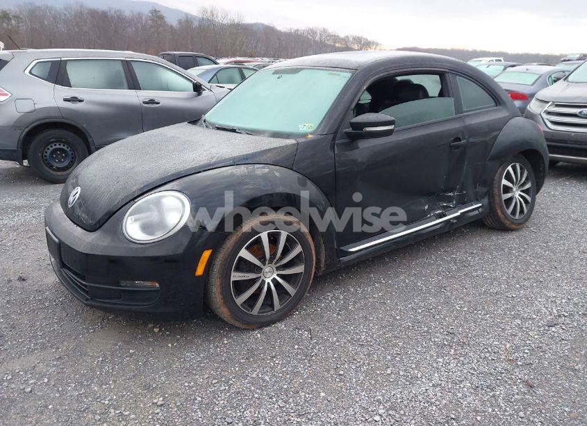 Photo 2 of 2014 Volkswagen Beetle 1.8T (VIN 3VWJ17AT4EM637462)