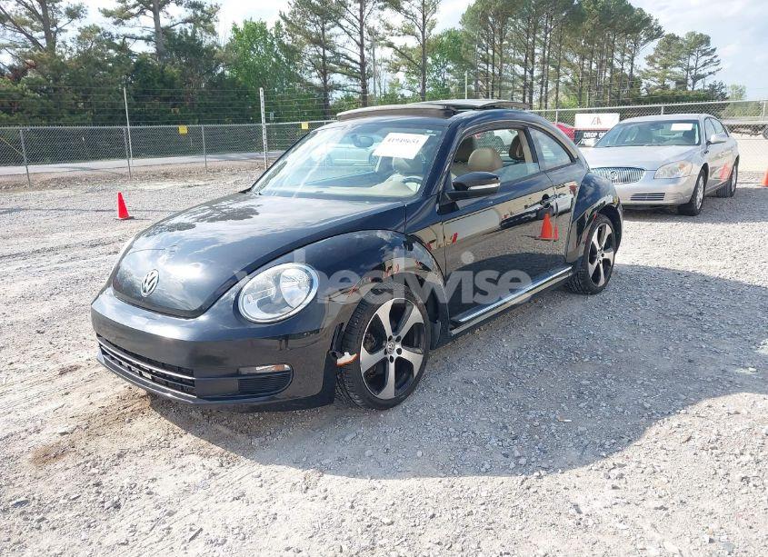 Photo 2 of 2014 Volkswagen Beetle 1.8T (VIN 3VWJ17ATXEM665198)