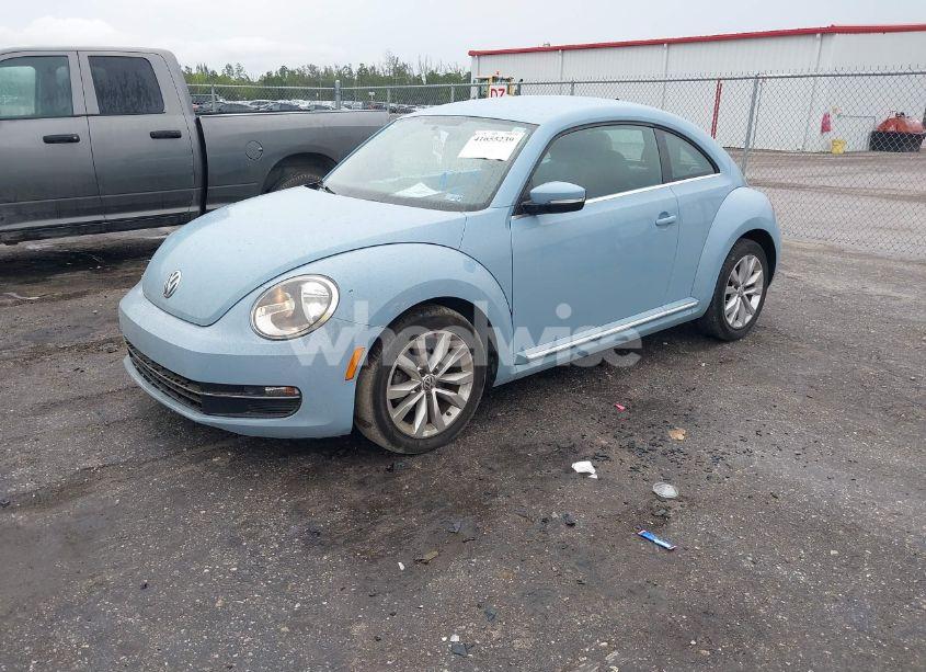 Photo 2 of 2014 Volkswagen Beetle 2.0L TDI (VIN 3VWJL7AT0EM659291)