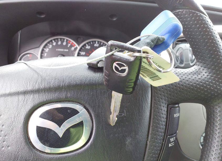 Photo 11 of 2005 Mazda Tribute S (VIN 4F2CZ04165KM52780)