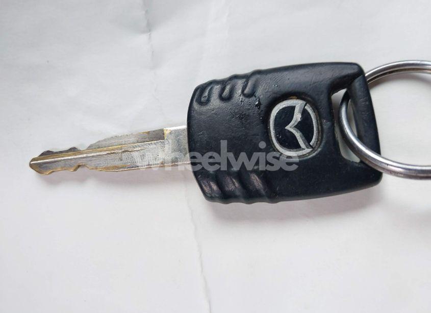 Photo 11 of 2005 Mazda Tribute S (VIN 4F2YZ04115KM49811)