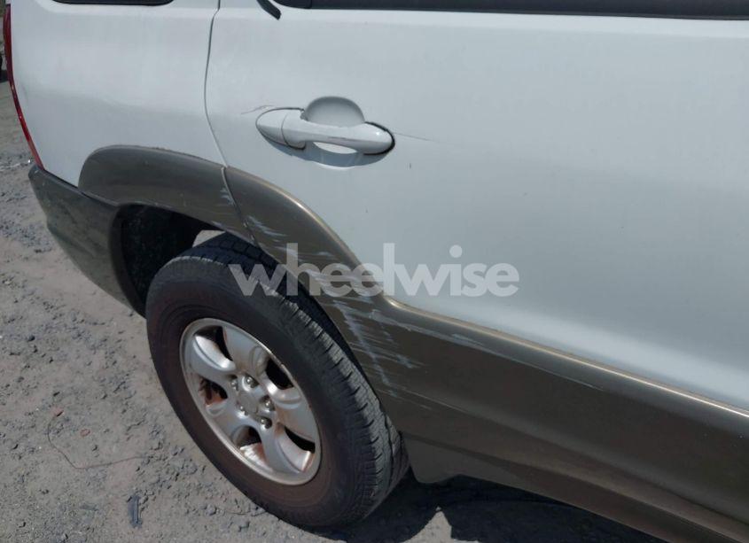 Photo 6 of 2004 Mazda Tribute LX V6 (VIN 4F2YZ04174KM31540)