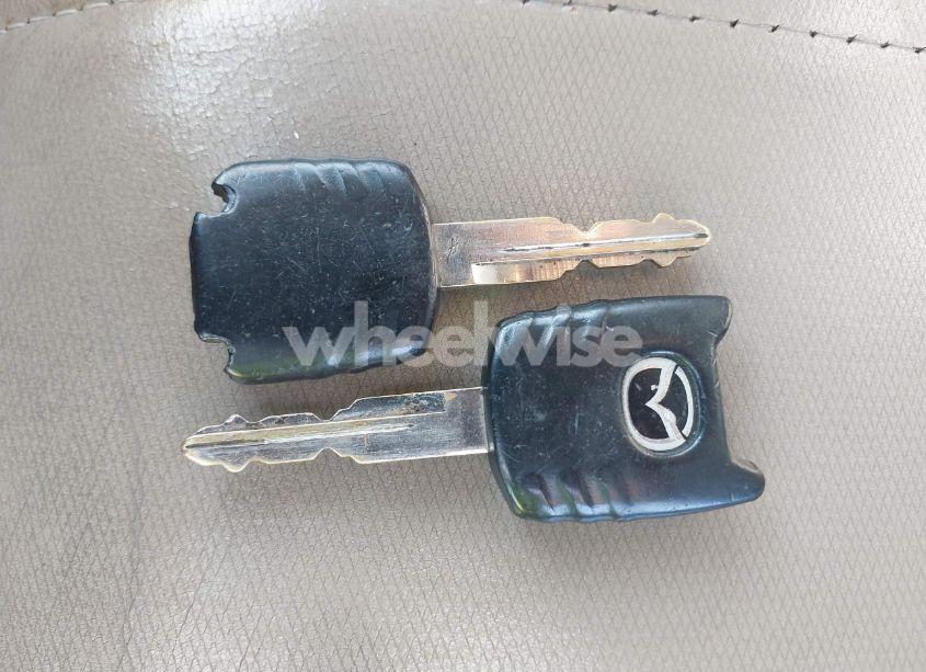 Photo 11 of 2005 Mazda Tribute S (VIN 4F2YZ06155KM26805)