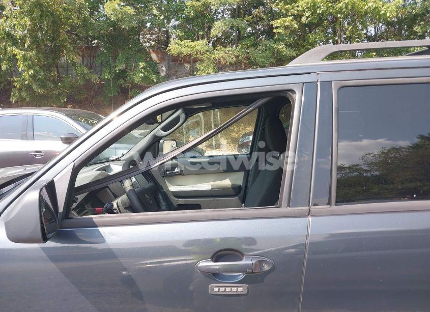 Photo 15 of 2010 Mercury Mariner (VIN 4M2CN8B79AKJ28843)