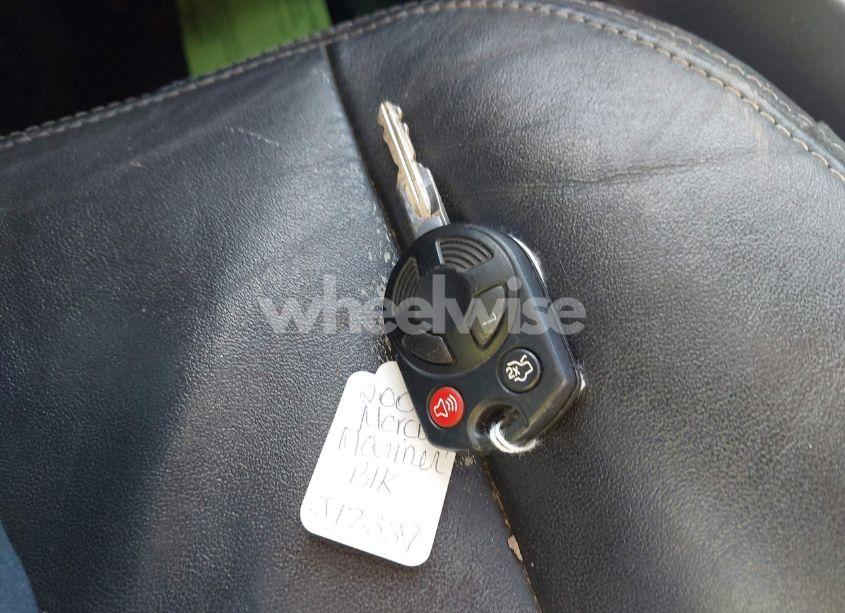 Photo 11 of 2009 Mercury Mariner V6 (VIN 4M2CU91G99KJ12339)