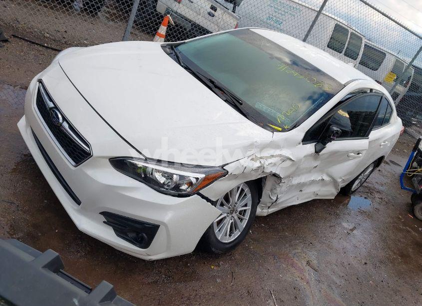 Photo 2 of 2017 Subaru Impreza PREMIUM (VIN 4S3GKAB68H3610660)