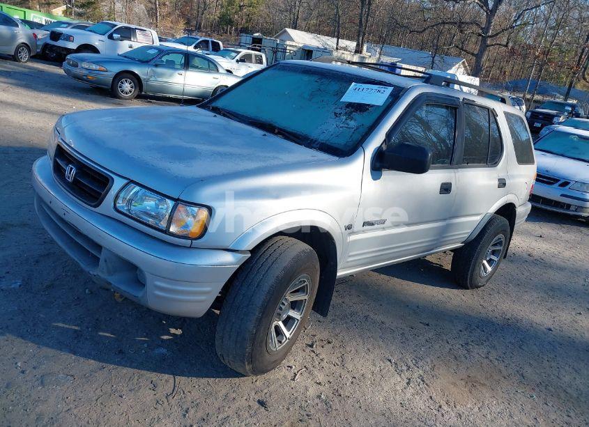 Photo 2 of 2000 Honda Passport EX/LX (VIN 4S6CK58W4Y4415990)