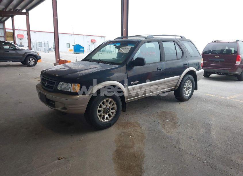 Photo 2 of 2000 Honda Passport EX/LX (VIN 4S6CK58W7Y4412436)