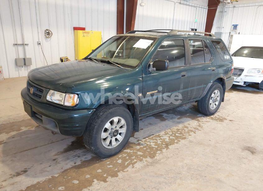 Photo 2 of 2000 Honda Passport EX/LX (VIN 4S6DM58W1Y4406601)