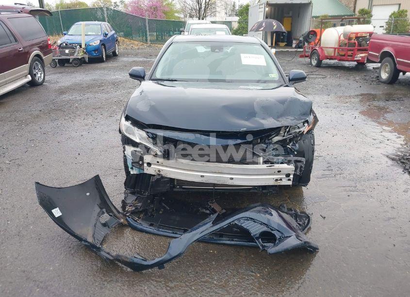 Photo 12 of 2019 Toyota Camry LE (VIN 4T1B11HK2KU747964)