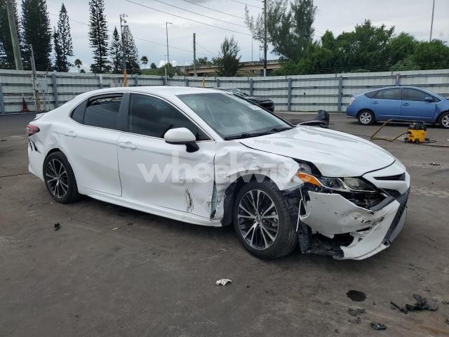 Photo 2 of 2019 TOYOTA CAMRY L (VIN 4T1B11HK5KU752799)