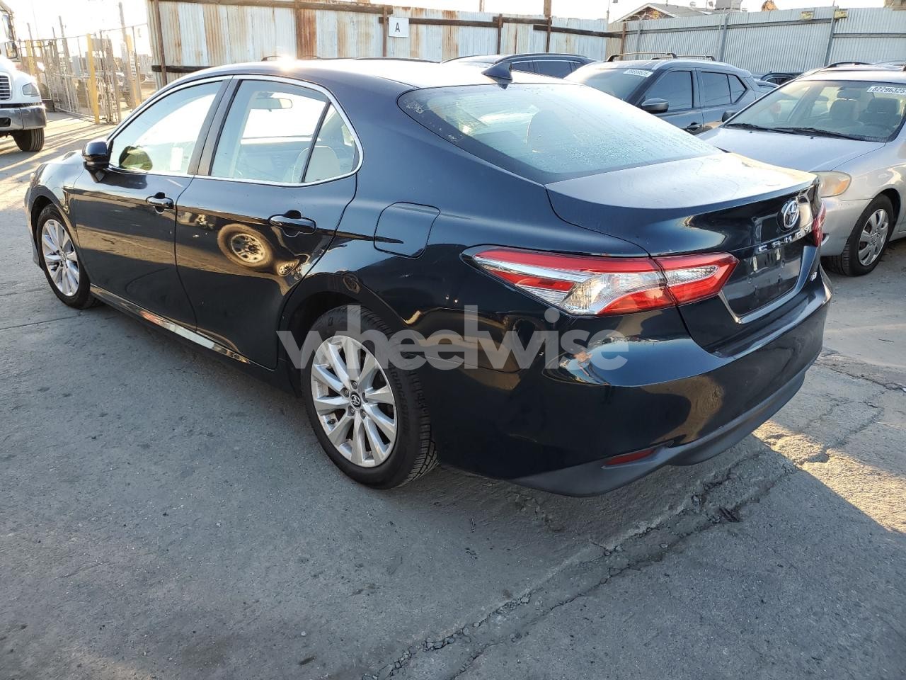 Photo 2 of 2019 TOYOTA CAMRY L (VIN 4T1B11HK6KU777601)
