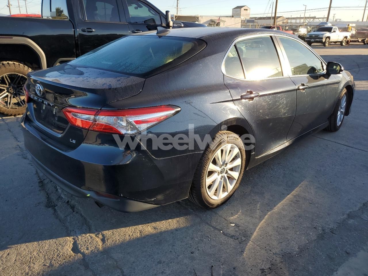 Photo 3 of 2019 TOYOTA CAMRY L (VIN 4T1B11HK6KU777601)