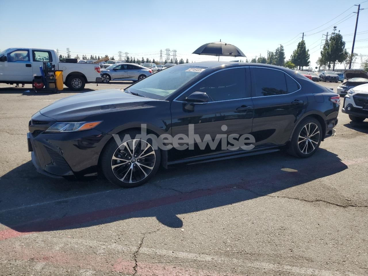 2019 TOYOTA CAMRY L (VIN 4T1B11HKXKU171721) main photo