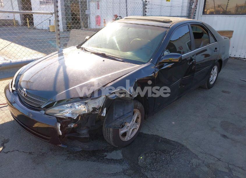 Photo 2 of 2002 Toyota Camry LE (VIN 4T1BE30KX2U080184)