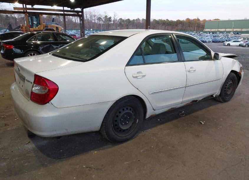 Photo 4 of 2002 Toyota Camry XLE (VIN 4T1BE30KX2U577283)