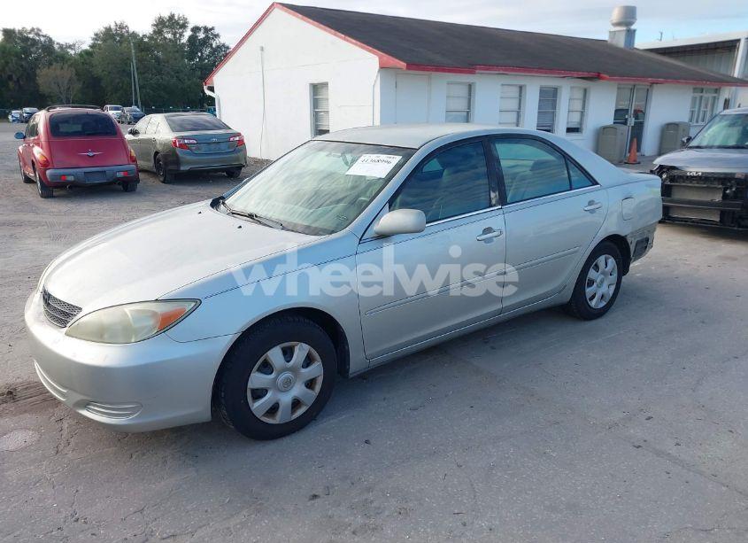 Photo 2 of 2003 Toyota Camry LE (VIN 4T1BE32K13U144160)