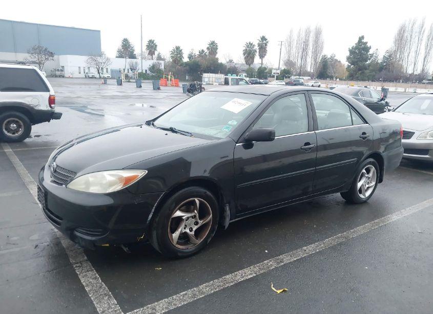 Photo 2 of 2002 Toyota Camry LE (VIN 4T1BE32K72U115597)