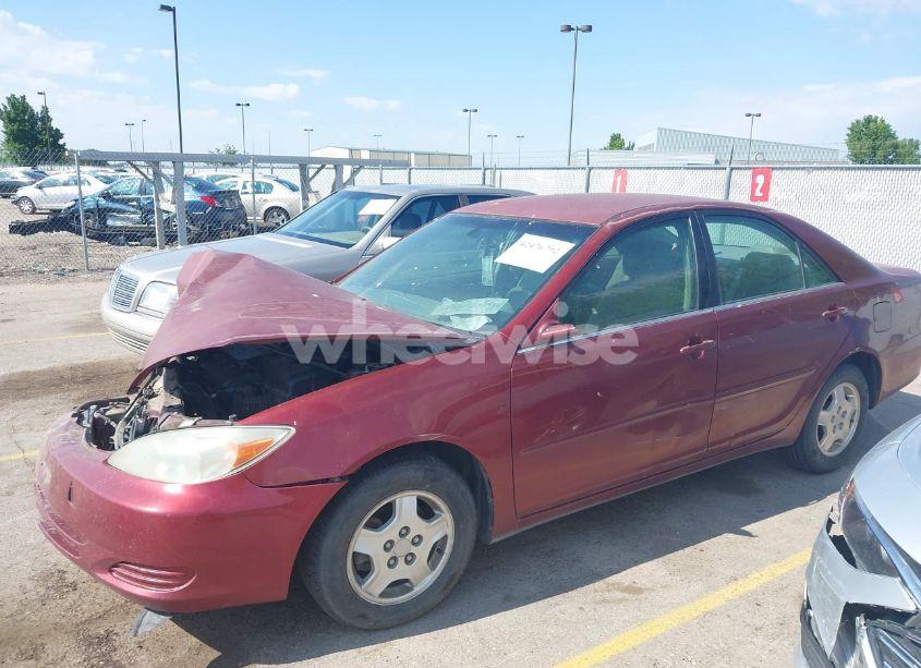 Photo 2 of 2002 Toyota Camry LE V6 (VIN 4T1BF30K12U006911)