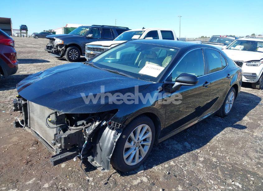 Photo 2 of 2021 Toyota Camry LE (VIN 4T1C11AK0MU539583)