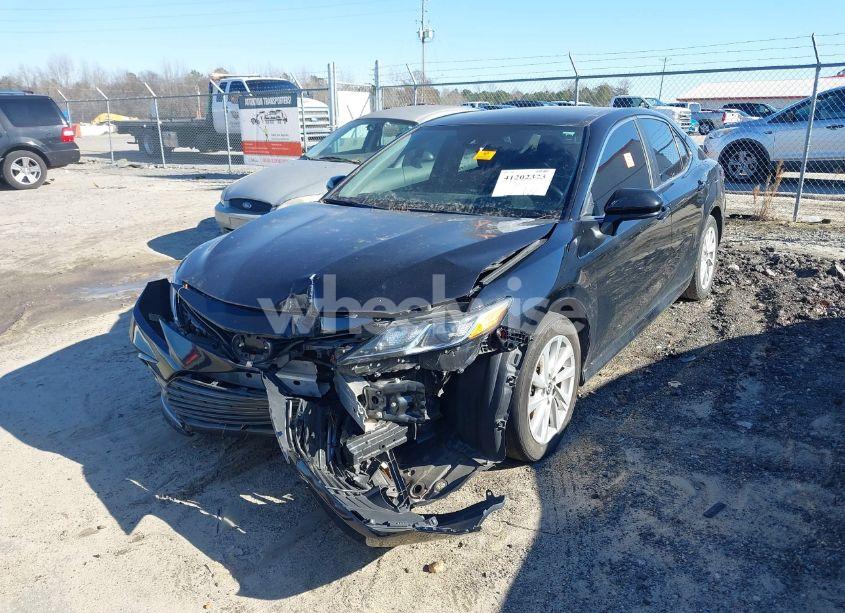 Photo 2 of 2021 Toyota Camry LE (VIN 4T1C11AK0MU546906)