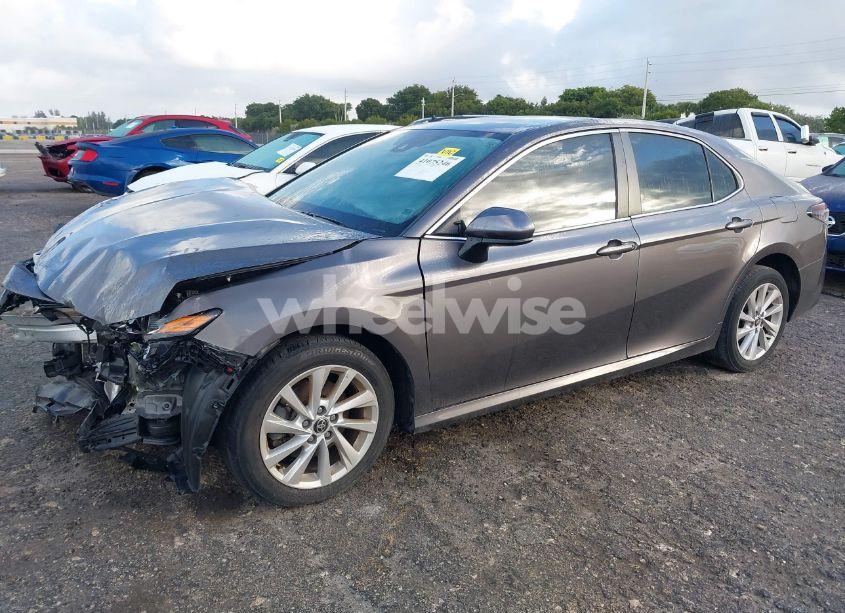 Photo 2 of 2021 Toyota Camry LE (VIN 4T1C11AK2MU594665)