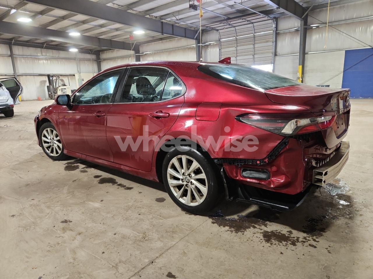 Photo 2 of 2021 TOYOTA CAMRY LE (VIN 4T1C11AK5MU565998)