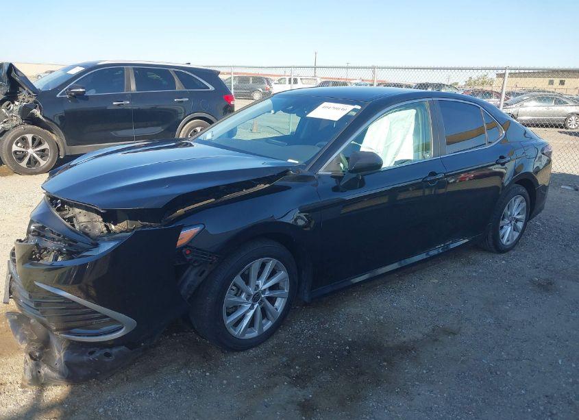 Photo 2 of 2021 Toyota Camry LE (VIN 4T1C11AK7MU551617)