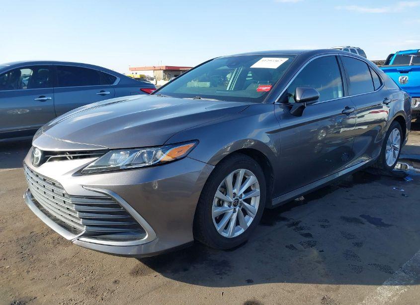 Photo 2 of 2021 Toyota Camry LE (VIN 4T1C11AK8MU567874)