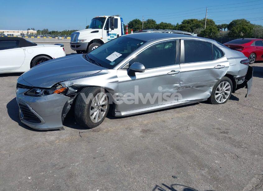 Photo 2 of 2021 Toyota Camry LE (VIN 4T1C11AK8MU595111)
