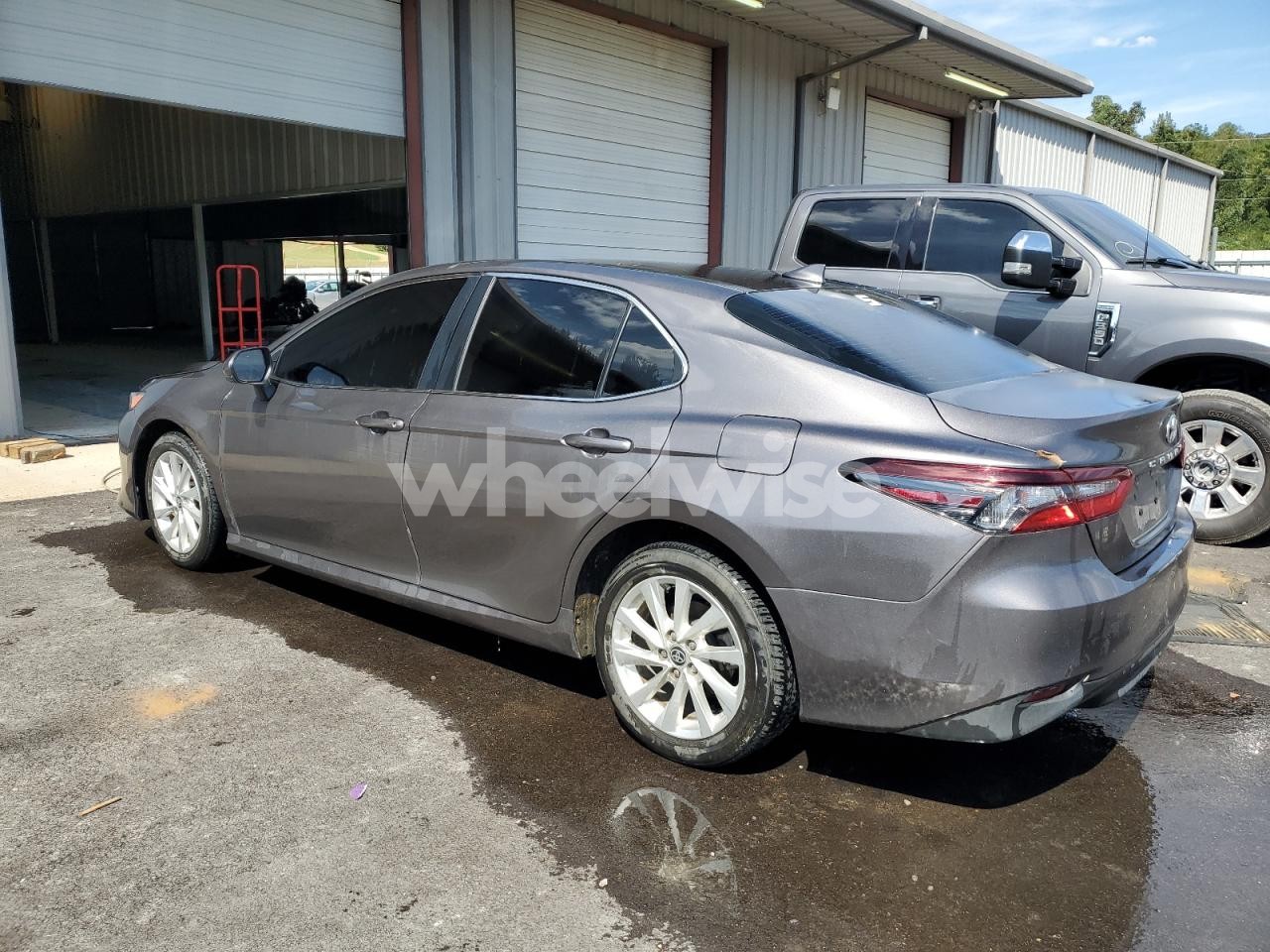 Photo 2 of 2024 TOYOTA CAMRY LE (VIN 4T1C11AK8RU197551)