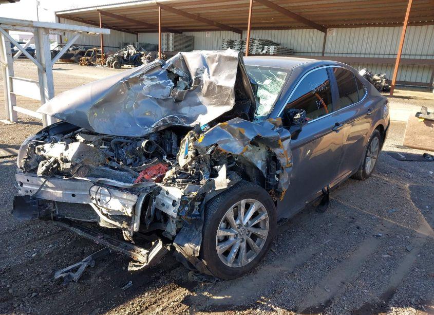 Photo 2 of 2021 Toyota Camry LE (VIN 4T1C11AKXMU446523)