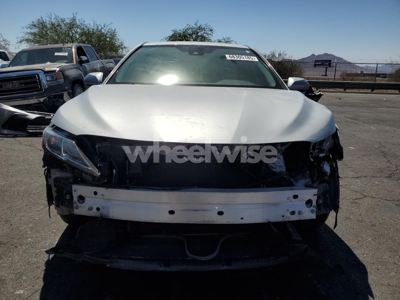 Photo 5 of 2022 TOYOTA CAMRY LE (VIN 4T1C11AKXNU037729)