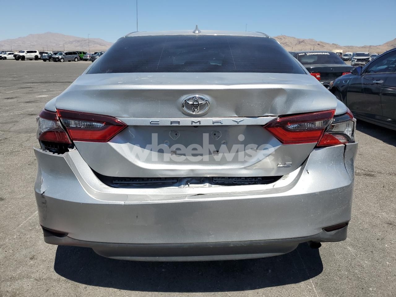 Photo 6 of 2022 TOYOTA CAMRY LE (VIN 4T1C11AKXNU037729)