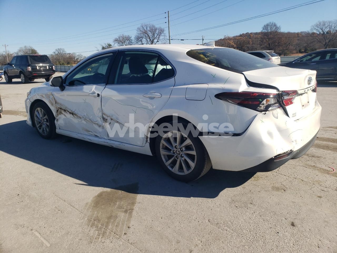 Photo 2 of 2023 TOYOTA CAMRY LE (VIN 4T1C11AKXPU744221)