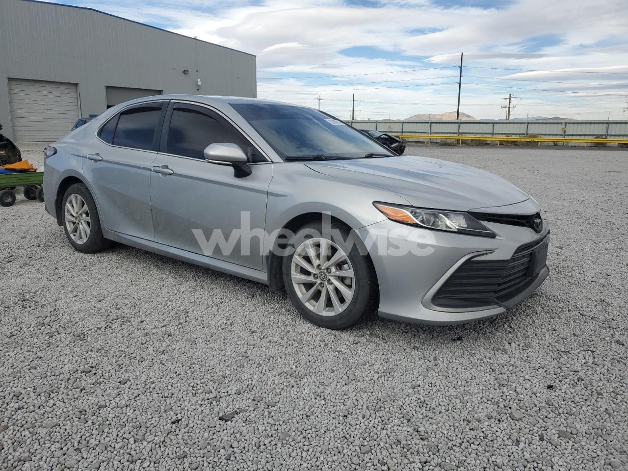 Photo 4 of 2022 TOYOTA CAMRY LE (VIN 4T1C11BK3NU062924)