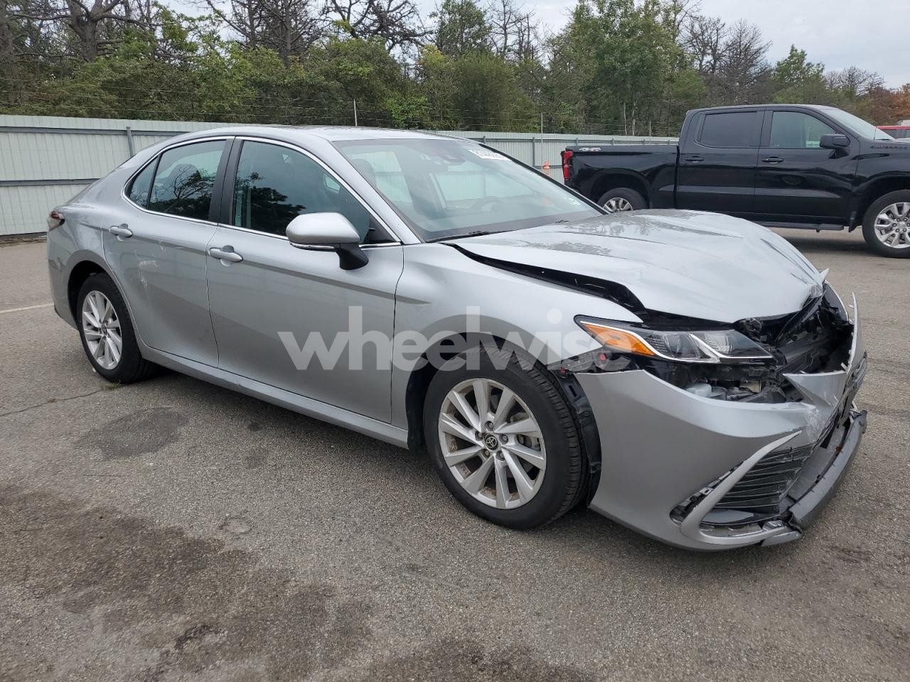 Photo 4 of 2022 TOYOTA CAMRY LE (VIN 4T1C11BK4NU065993)