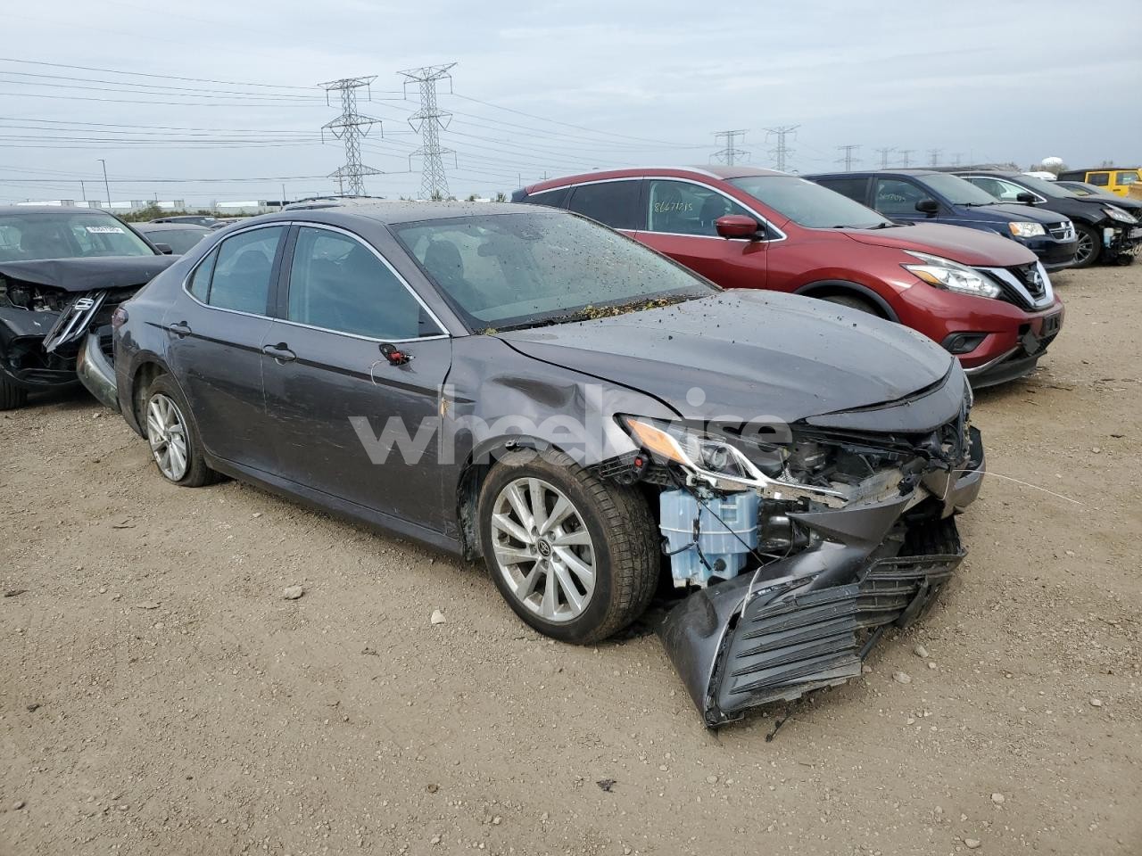 Photo 4 of 2021 TOYOTA CAMRY LE (VIN 4T1C11BK7MU021324)