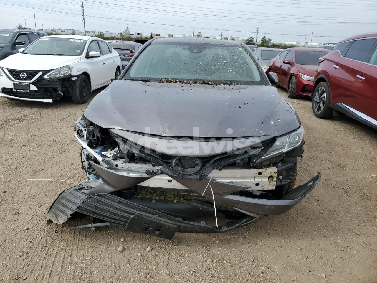 Photo 5 of 2021 TOYOTA CAMRY LE (VIN 4T1C11BK7MU021324)