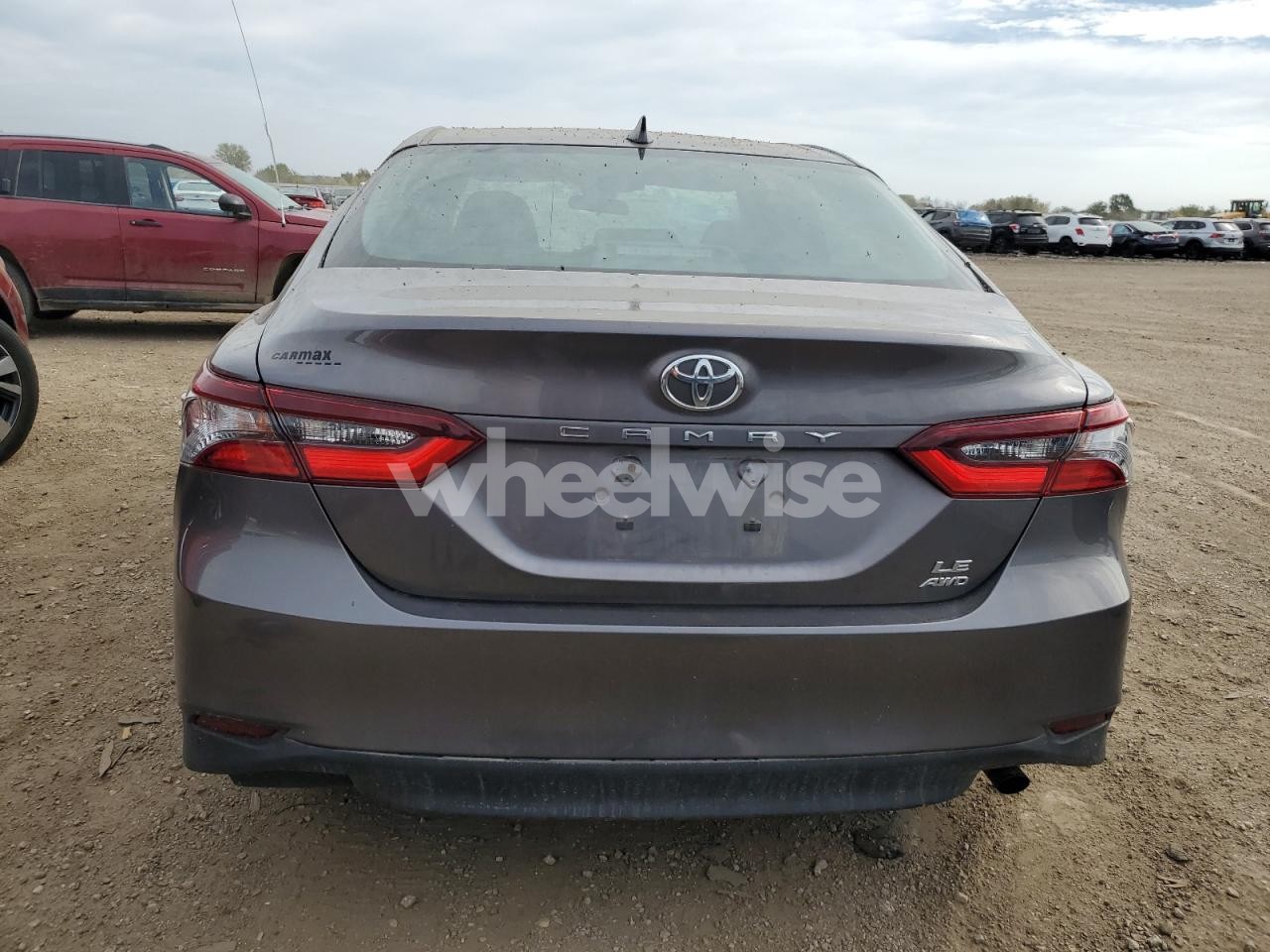 Photo 6 of 2021 TOYOTA CAMRY LE (VIN 4T1C11BK7MU021324)